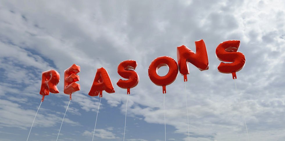 Red balloons in sky that spell "Reasons"